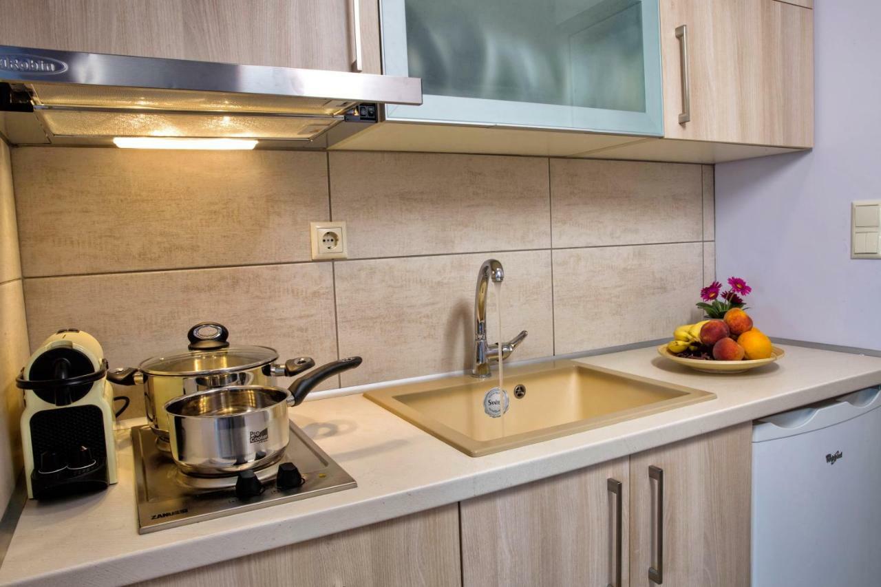 Isalos Suites Néa Péramos Esterno foto